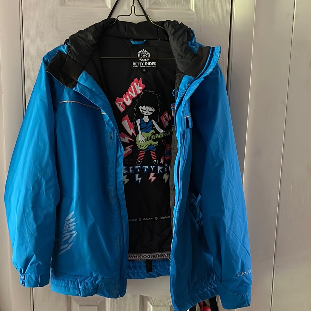 Betty Rides Blue Jacket
